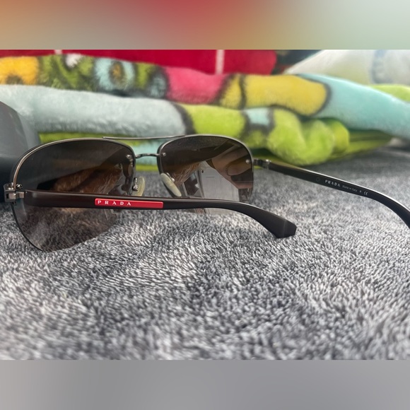 Prada sunglasses. No scratches, only worn a few times. - Picture 3 of 5